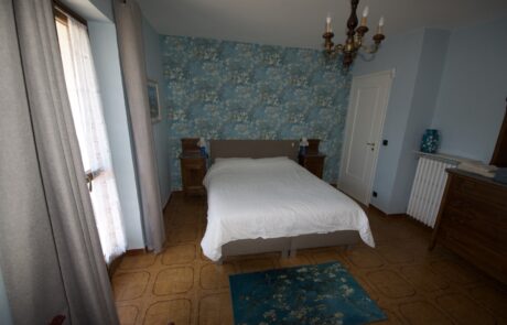 Letto matrimoniale nella camera da letto di La Cascina